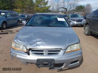 2001 Honda Accord Cpe EX with VIN 1HGCG31571A005892, listed as a IAAI auction lot 42022588 with 202,497 mi miles. Bid and sale history available at carsss.com. Image 13.
