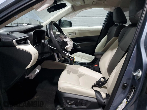 2023 Toyota Corolla Cross XLE with VIN 7MUEAABG4PV062131, listed as a Copart auction lot 56090105 with 43,409 mi miles and Salvage title. Bid and sale history available at DreamBid. Image 7.