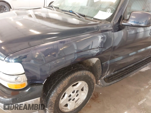 2004 Chevrolet Suburban LT with VIN 3GNEC16T34G322967, listed as a IAAI auction lot 41701602 with 157,768 mi miles. Bid and sale history available at carsss.com. Image 6.