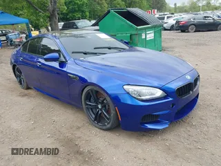 2014 BMW M6 z VIN WBS6C9C54EDV73943, wystawiony jako IAAI lot #42294944 z przebiegiem 129 823 mil mil oraz . Historia ofert i sprzedaży dostępna na DreamBid. Obrazek 1.