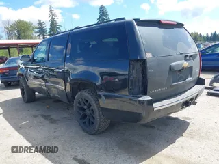 2011 Chevrolet Suburban LTZ with VIN 1GNSKKE3XBR171202, listed as a IAAI auction lot 42130901 with 177,035 mi miles. Bid and sale history available at carsss.com. Image 3.