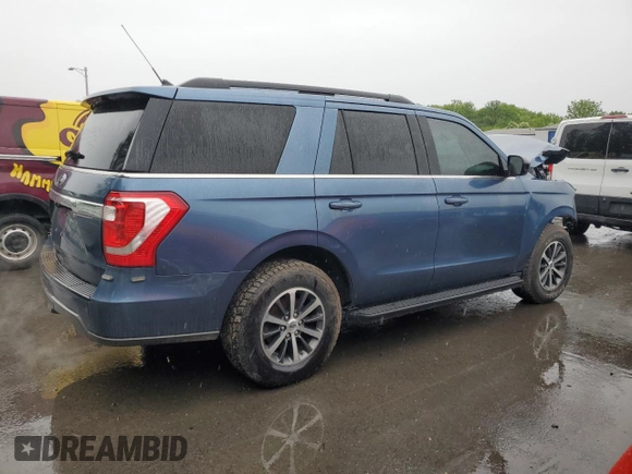 2020 Ford Expedition XL with VIN 1FMJU1GTXLEA78111, listed as a Copart auction lot 58079055 with 76,664 mi miles and Salvage title. Bid and sale history available at DreamBid. Image 3.