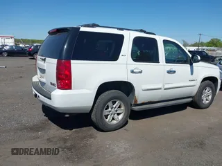 2007 GMC Yukon SLT with VIN 1GKFK13007R319995, listed as a IAAI auction lot 42142010 with 248,723 mi miles. Bid and sale history available at carsss.com. Image 4.