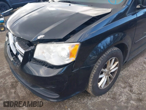 2014 Dodge Grand Caravan SXT with VIN 2C4RDGCG4ER337202, listed as a IAAI auction lot 40781755 with 258,524 mi miles and . Bid and sale history available at DreamBid. Image 14.