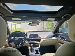 2021 Cadillac CT4 Premium Luxury z VIN 1G6DB5RK6M0147994, wystawiony jako Copart lot #59520245 z przebiegiem 15 866 mil mil oraz Czysty tytuł • Clean title. Historia ofert i sprzedaży dostępna na DreamBid. Obrazek 9.