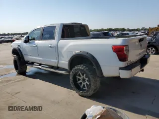 2016 Nissan Titan Platinum Reserve z VIN 1N6BA1F21GN513109, wystawiony jako Copart lot #64840434 z przebiegiem 94 263 mil mil oraz Czysty tytuł • Clean title. Historia ofert i sprzedaży dostępna na DreamBid. Obrazek 2.