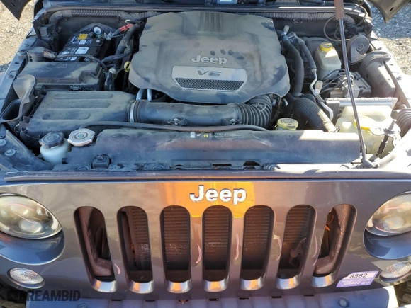 2017 Jeep Wrangler Unlimited Rubicon with VIN 1C4HJWFG2HL540967, listed as a Copart auction lot 83361554 with 137,313 mi miles and Salvage Title. Bid and sale history available at carsss.com. Image 12.