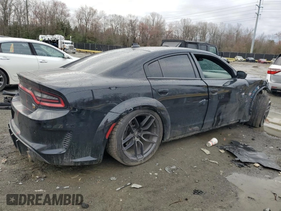 2021 Dodge Charger Scat Pack Widebody with VIN 2C3CDXGJ3MH620792, listed as a Copart auction lot 48355595 with 72,379 mi miles and Salvage Title. Bid and sale history available at carsss.com. Image 3.