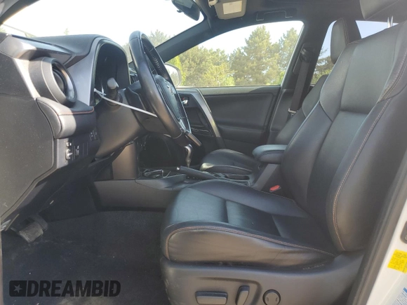 2016 Toyota RAV4 SE with VIN JTMJFREV3GJ054196, listed as a Copart auction lot 56556805 with 130,104 mi miles and Salvage title. Bid and sale history available at DreamBid. Image 7.
