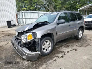 2008 GMC Envoy SLE2 with VIN 1GKDS13S082259610, listed as a Copart auction lot 71863234 with 354,113 mi miles and Salvage Title. Bid and sale history available at DreamBid. Image 1.
