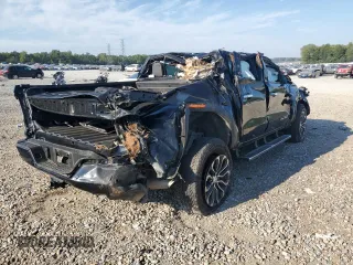 2023 GMC Canyon 4WD Denali with VIN 1GTP6FEK6P1263009, listed as a Copart auction lot 71101004 with 0 mi miles and Salvage Title. Bid and sale history available at carsss.com. Image 3.