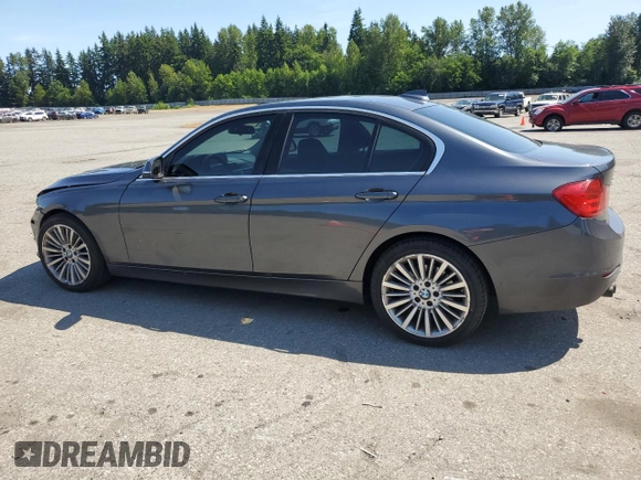 2015 BMW 3 Series 328i xDrive with VIN WBA3B3C5XFJ985147, listed as a Copart auction lot 59819905 with 113,492 mi miles and Salvage title. Bid and sale history available at DreamBid. Image 2.