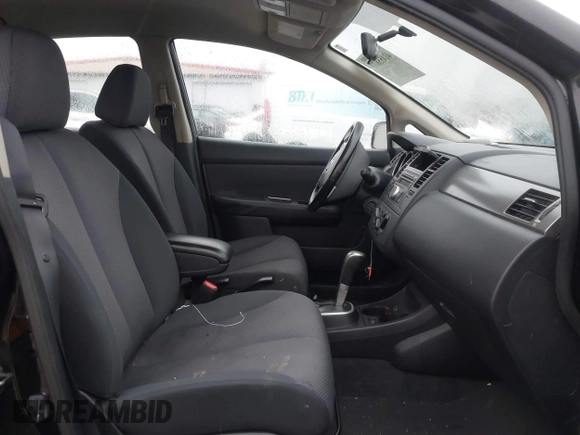 2009 Nissan Versa 1.8 SL with VIN 3N1BC13EX9L390055, listed as a IAAI auction lot 41455877 with 126,718 mi miles. Bid and sale history available at carsss.com. Image 5.
