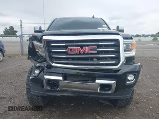 2015 GMC Sierra 2500HD SLT with VIN 1GT12ZE87FF552599, listed as a IAAI auction lot 40054977 with 146,190 mi miles and . Bid and sale history available at DreamBid. Image 11.