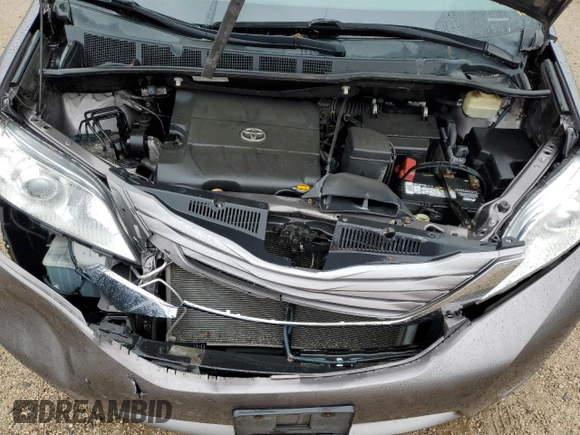 2015 Toyota Sienna XLE with VIN 5TDYK3DC0FS686792, listed as a Copart auction lot 57472045 with 222,663 mi miles and Salvage title. Bid and sale history available at DreamBid. Image 12.
