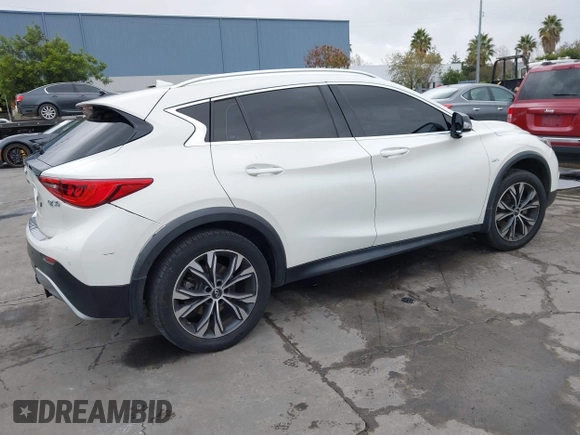2018 Infiniti QX30 Premium with VIN SJKCH5CR8JA048030, listed as a IAAI auction lot 41097383 with 131,820 mi miles and . Bid and sale history available at DreamBid. Image 4.