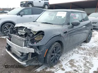 2020 MINI Hardtop Cooper S z VIN WMWXR5C07L2L60692, wystawiony jako IAAI lot #41621462 z przebiegiem 66 898 mil mil oraz . Historia ofert i sprzedaży dostępna na DreamBid. Obrazek 18.