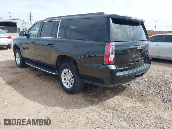 2018 GMC Yukon XL SLT with VIN 1GKS1GKC3JR223544, listed as a IAAI auction lot 41822836 with 164,430 mi miles and . Bid and sale history available at carsss.com. Image 3.