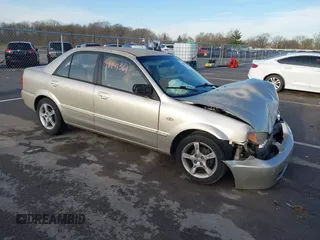 2003 Mazda Protege DX with VIN JM1BJ225X31160766, listed as a IAAI auction lot 41941361 with 190,125 mi miles and . Bid and sale history available at DreamBid. Image 1.