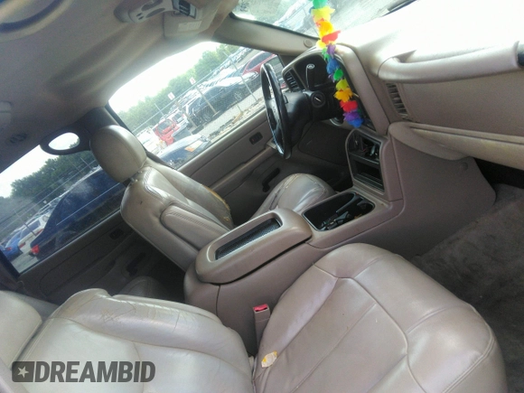 2004 Chevrolet Tahoe LT with VIN 1GNEC13ZX4R203631, listed as a IAAI auction lot 42797033 with Not provided miles and . Bid and sale history available at DreamBid. Image 5.
