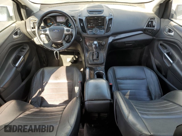2014 Ford Escape Titanium z VIN 1FMCU0J9XEUD01904, wystawiony jako Copart lot #61819555 z przebiegiem 217 794 mil mil oraz Czysty tytuł • Clean title. Historia ofert i sprzedaży dostępna na DreamBid. Obrazek 8.