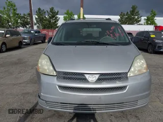 2004 Toyota Sienna CE with VIN 5TDZA23C04S032956, listed as a IAAI auction lot 42121153 with 218,908 mi miles. Bid and sale history available at carsss.com. Image 6.