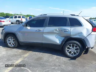 2014 Jeep Cherokee Latitude with VIN 1C4PJLCS6EW103423, listed as a IAAI auction lot 40118289 with 112,120 mi miles and . Bid and sale history available at DreamBid. Image 18.
