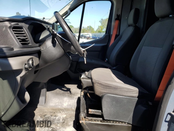 2020 Ford Transit Cargo with VIN 1FTBR3X8XLKA72246, listed as a Copart auction lot 57000035 with 65,458 mi miles and Salvage Title. Bid and sale history available at DreamBid. Image 7.