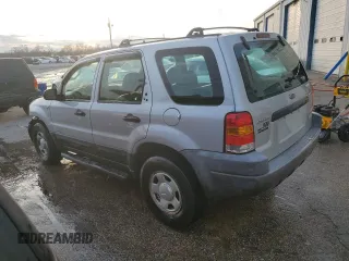 2002 Ford Escape XLS Choice with VIN 1FMYU01162KC61229, listed as a Copart auction lot 41985085 with 74,203 mi miles and Salvage title. Bid and sale history available at DreamBid. Image 2.