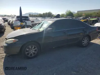 2003 Toyota Camry LE z VIN 4T1BF32K73U048949, wystawiony jako Copart lot #57489965 z przebiegiem 88 668 mil mil oraz Szkoda całkowita • Salvage title. Historia ofert i sprzedaży dostępna na DreamBid. Obrazek 1.