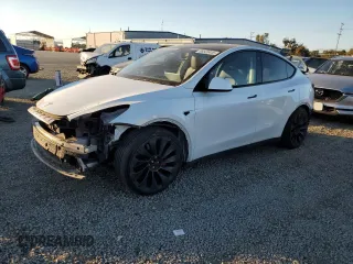 2022 Tesla Model Y Performance z VIN 7SAYGDEF5NF493186, wystawiony jako Copart lot #88520445 z przebiegiem 69 690 mil mil oraz Szkoda całkowita • Salvage title. Historia ofert i sprzedaży dostępna na DreamBid. Obrazek 1.