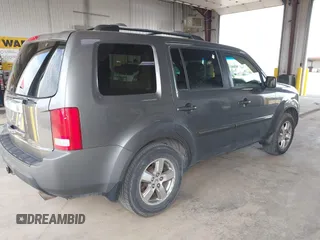 2009 Honda Pilot EX with VIN 5FNYF48419B021891, listed as a IAAI auction lot 42241327 with 178,926 mi miles and . Bid and sale history available at DreamBid. Image 4.