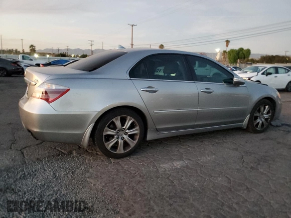 2009 Acura RL Tech Pkg with VIN JH4KB266X9C002410, listed as a Copart auction lot 85615504 with 192,840 mi miles and Salvage Title. Bid and sale history available at carsss.com. Image 3.
