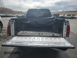 2002 Ford F-150 XL with VIN 1FTRF17212KC06180, listed as a Copart auction lot 45336625 with 214,139 mi miles and Salvage title. Bid and sale history available at DreamBid. Image 6.
