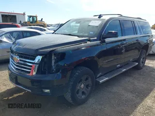 2016 Chevrolet Suburban LT with VIN 1GNSKHKC4GR275389, listed as a IAAI auction lot 41796216 with 144,776 mi miles and . Bid and sale history available at DreamBid. Image 18.