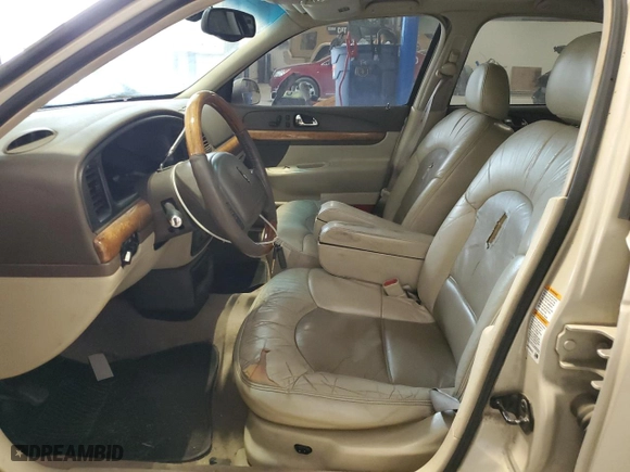 2002 Lincoln Continental with VIN 1LNHM97VX2Y694578, listed as a Copart auction lot 42245705 with 195,236 mi miles and Salvage Title. Bid and sale history available at carsss.com. Image 7.