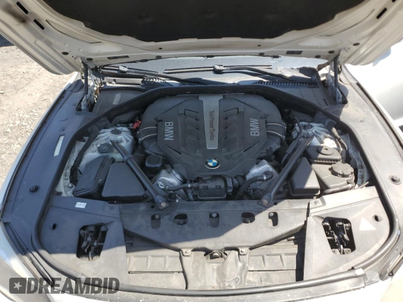 2012 BMW 7 Series 750Li xDrive z VIN WBAKC8C54CC434833, wystawiony jako Copart lot #54531455 z przebiegiem 110 959 mil mil oraz Szkoda całkowita • Salvage title. Historia ofert i sprzedaży dostępna na DreamBid. Obrazek 11.