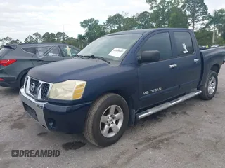 2007 Nissan Titan XE with VIN 1N6BA07AX7N236492, listed as a IAAI auction lot 41668602 with 205,028 mi miles. Bid and sale history available at carsss.com. Image 2.