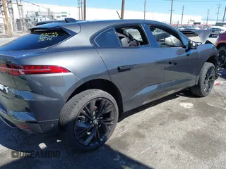 2024 Jaguar I-Pace R-Dynamic HSE z VIN SADHM2S10R1632727, wystawiony jako IAAI lot #41670704 z przebiegiem 4110 mil mil oraz . Historia ofert i sprzedaży dostępna na DreamBid. Obrazek 4.