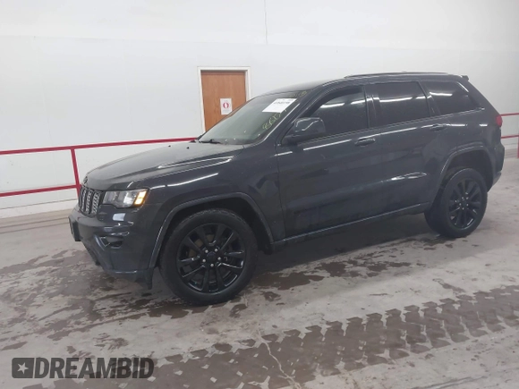 2017 Jeep Grand Cherokee Altitude with VIN 1C4RJFAG9HC886171, listed as a IAAI auction lot 41840198 with 125,616 mi miles and . Bid and sale history available at DreamBid. Image 2.