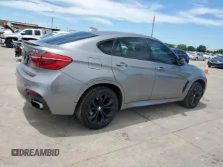 2017 BMW X6 z VIN 5UXKU6C31H0W38581, wystawiony jako Copart lot #58042385 z przebiegiem 124 789 mil mil oraz Tytuł czysty. Historia ofert i sprzedaży dostępna na DreamBid. Obrazek 3.