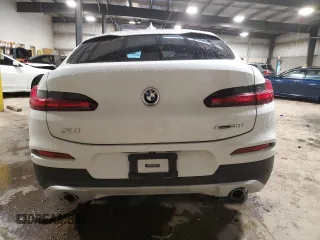 2021 BMW X4 xDrive30i with VIN 5UX2V1C01M9H64891, listed as a Copart auction lot 56797025 with Not provided miles and Salvage title. Bid and sale history available at DreamBid. Image 6.