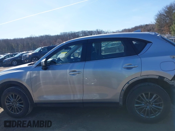 2018 Mazda CX-5 Sport with VIN JM3KFBBM6J0336683, listed as a IAAI auction lot 41737817 with 94,881 mi miles. Bid and sale history available at carsss.com. Image 15.