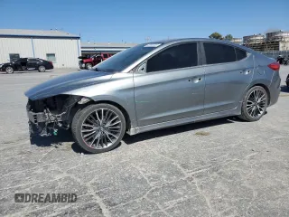 2018 Hyundai Elantra Sport с VIN KMHD04LB8JU576690, выставлен на аукционе Copart как лот 49690335 с пробегом 106 274 миль миль и Списание • Salvage title. История ставок и продаж доступна на DreamBid. Изображение 1.