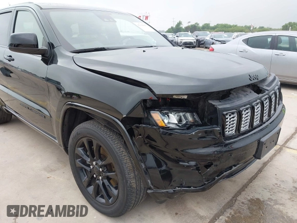 2021 Jeep Grand Cherokee Laredo X with VIN 1C4RJEAG8MC714539, listed as a IAAI auction lot 42190686 with 59,359 mi miles and . Bid and sale history available at DreamBid. Image 6.