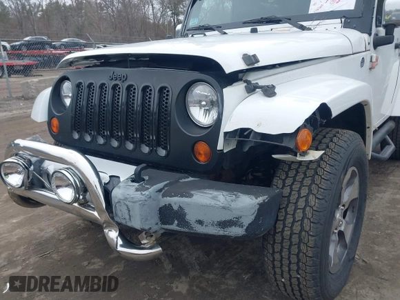 2011 Jeep Wrangler Sahara with VIN 1J4AA5D15BL538240, listed as a IAAI auction lot 41793836 with 172,528 mi miles and . Bid and sale history available at carsss.com. Image 6.
