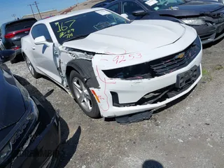 2019 Chevrolet Camaro 1LS with VIN 1G1FB1RX5K0130443, listed as a IAAI auction lot 41586492 with 122,538 mi miles. Bid and sale history available at carsss.com. Image 1.