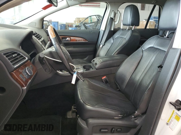 2011 Lincoln MKX with VIN 2LMDJ8JK4BBJ28692, listed as a Copart auction lot 53305785 with 127,939 mi miles and Salvage Title. Bid and sale history available at carsss.com. Image 7.