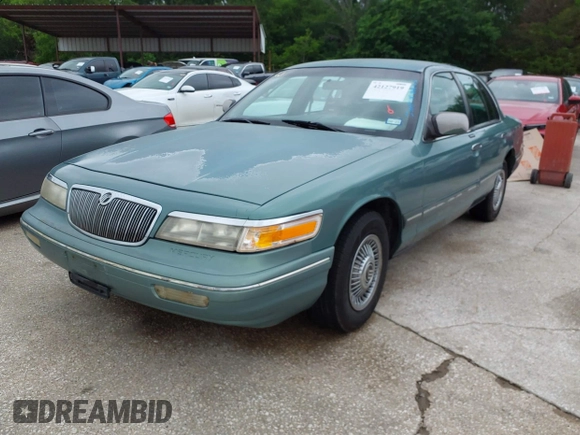 1997 Mercury Grand Marquis GS z VIN 2MELM74W8VX735986, wystawiony jako IAAI lot #42127919 z przebiegiem 135 895 mil mil oraz . Historia ofert i sprzedaży dostępna na DreamBid. Obrazek 2.