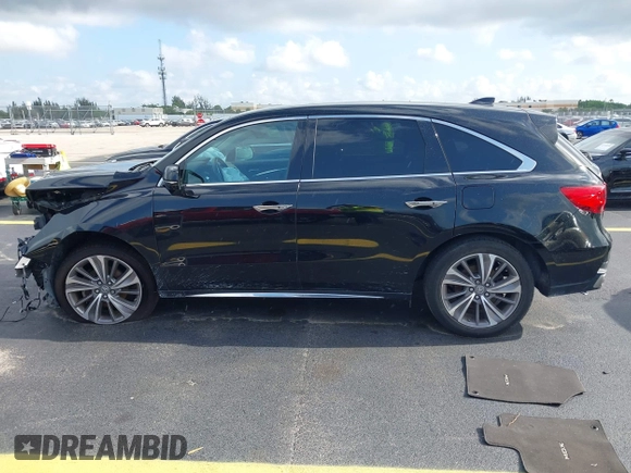 2018 Acura MDX Technology with VIN 5J8YD4H73JL017988, listed as a IAAI auction lot 42351398 with 102,733 mi miles and . Bid and sale history available at DreamBid. Image 14.